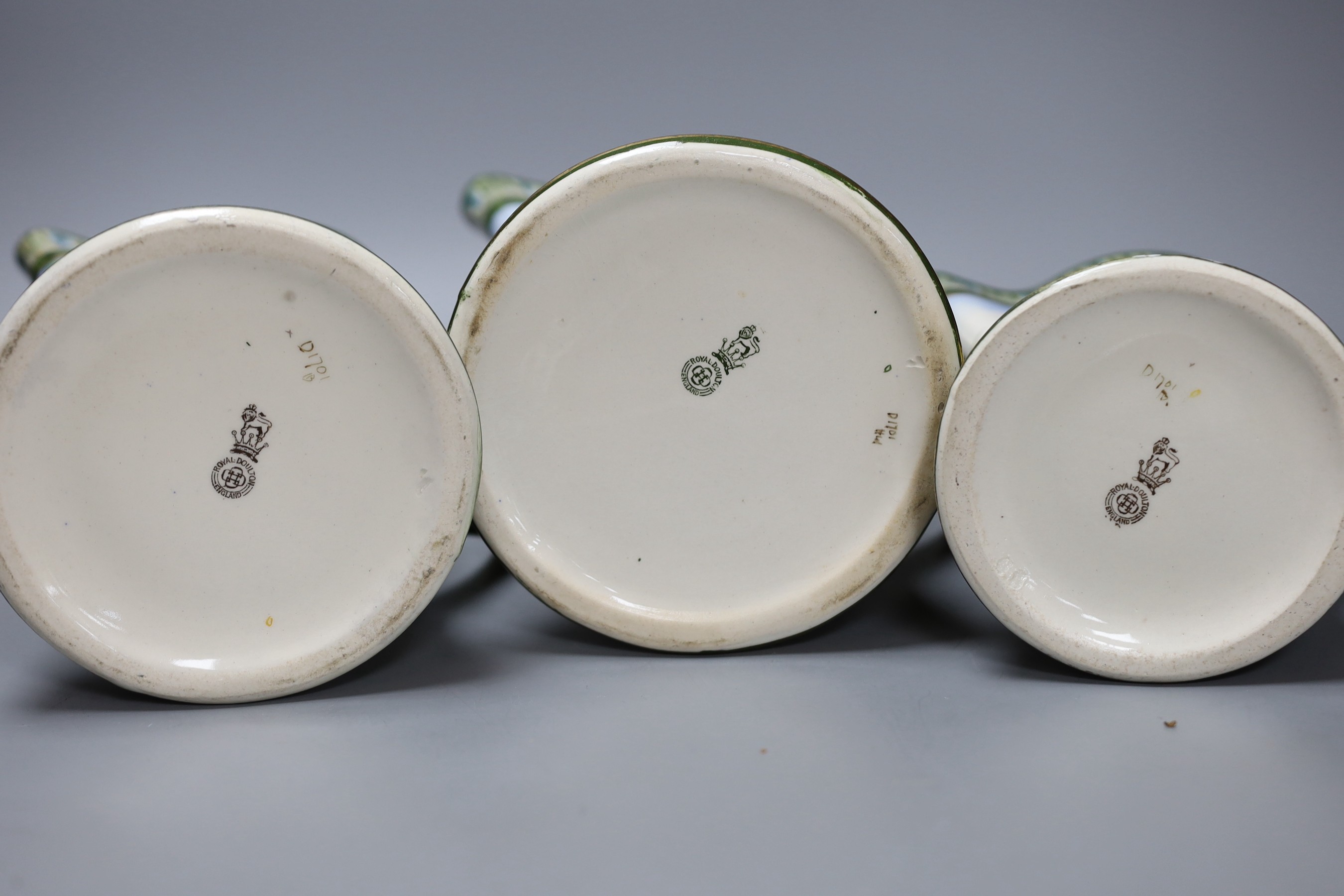 A graduated set of three Royal Doulton hunting jugs, 22cm